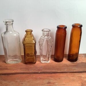 5 antique glass vials